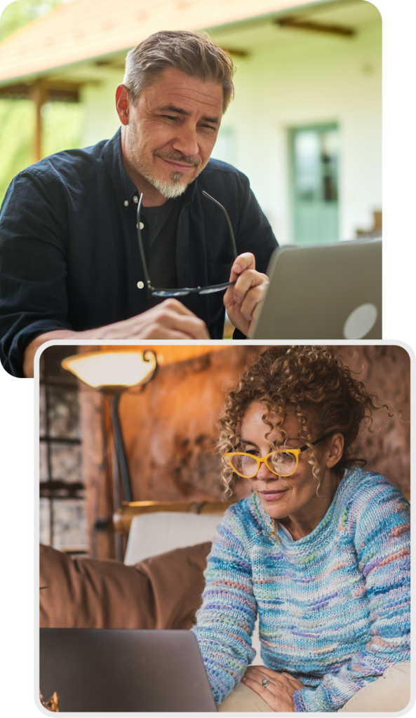 Man and women sitting down studying on their laptop.